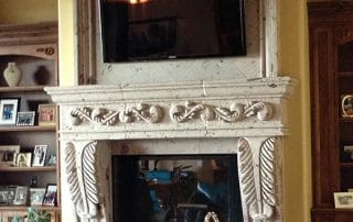 floating tv over fireplace